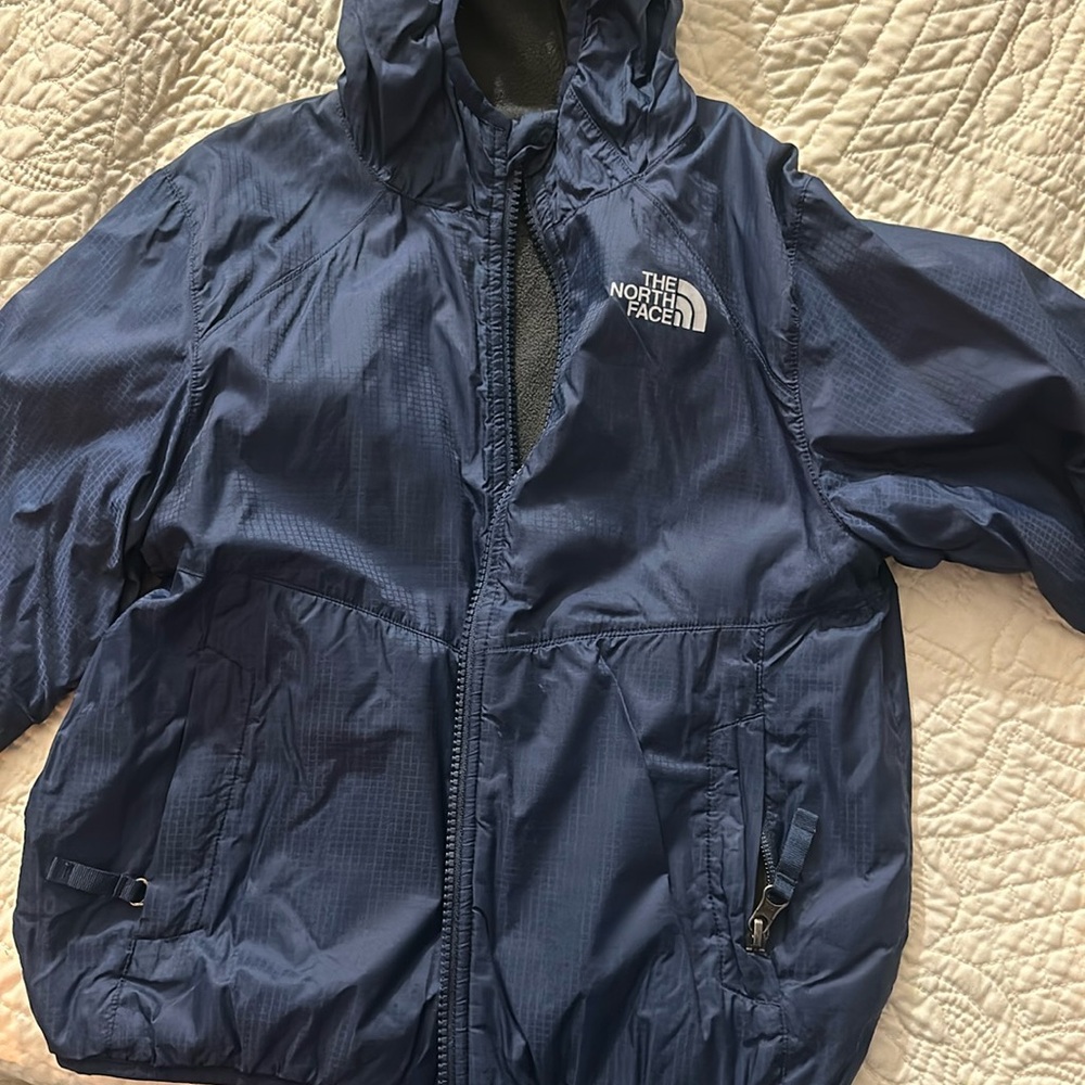 Two sided jacket can’t seem to find the size seems to be size 5/6